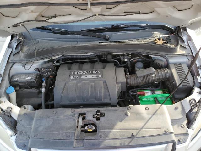 Photo 12 from auction – 2006 HONDA PILOT EX with VIN 2HKYF18576H525821