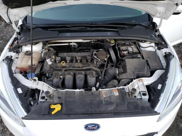 Photo 11 from auction – 2015 FORD FOCUS SE with VIN 1FADP3F23FL338075