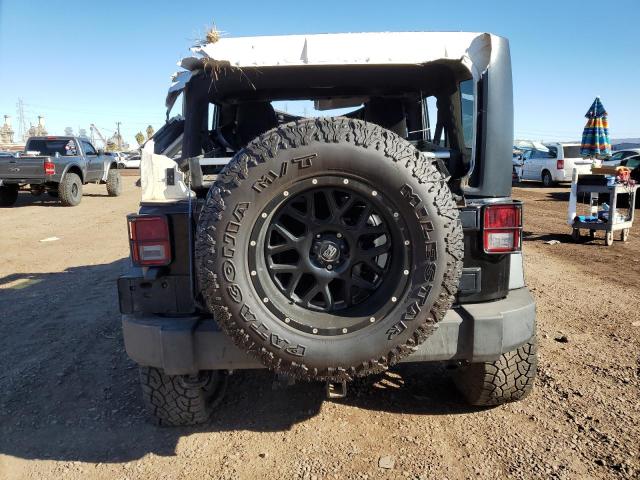 Photo 6 from auction – 2014 JEEP WRANGLER U with VIN 1C4BJWDG5EL125419
