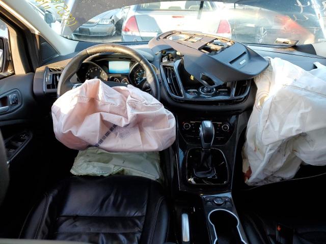 Photo 8 from auction – 2015 FORD ESCAPE TIT with VIN 1FMCU9J9XFUC41029