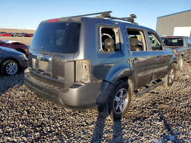 Photo 3 from auction – 2011 HONDA PILOT TOUR with VIN 5FNYF4H9XBB005609