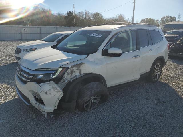 HONDA PILOT ELIT 2017 with VIN 5FNYF6H0XHB002330 - Photo from auction