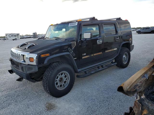 HUMMER H2 2003 with VIN 5GRGN23U23H138704 - Photo from auction