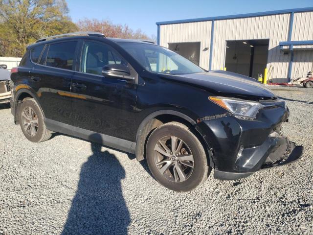 Photo 4 from auction – 2016 TOYOTA RAV4 XLE with VIN 2T3RFREV2GW409587