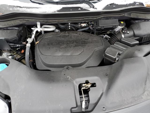 Photo 12 from auction – 2021 HONDA PASSPORT E with VIN 5FNYF8H52MB042869