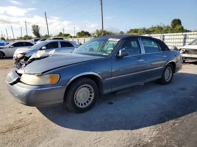 LINCOLN TOWN CAR E 2000 with VIN 1LNHM81W6YY766414 - Photo from auction