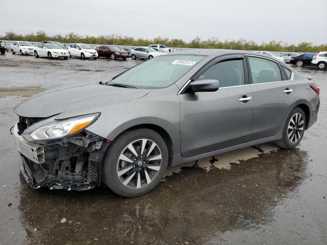 NISSAN ALTIMA 2.5 2018 with VIN 1N4AL3AP7JC242900 - Photo from auction