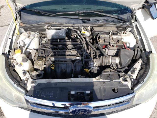 Photo 11 from auction – 2011 FORD FOCUS S with VIN 1FAHP3EN1BW115460
