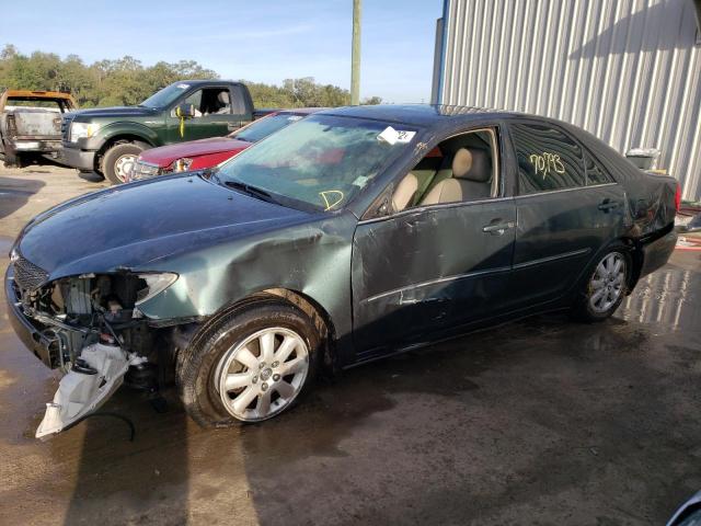 TOYOTA CAMRY LE 2003 with VIN 4T1BF30K93U559517 - Photo from auction