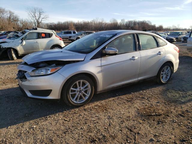 FORD FOCUS SE 2015 with VIN 1FADP3F21FL210921 - Photo from auction