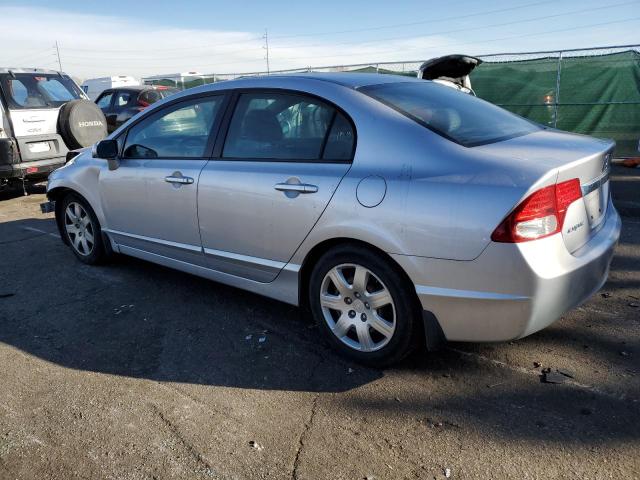 Photo 2 from auction – 2011 HONDA CIVIC LX with VIN 19XFA1F54BE031469