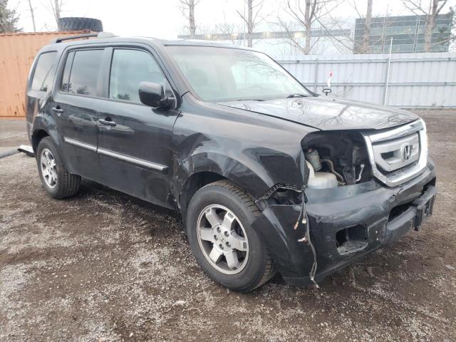 Photo 4 from auction – 2010 HONDA PILOT TOUR with VIN 5FNYF4H94AB504940