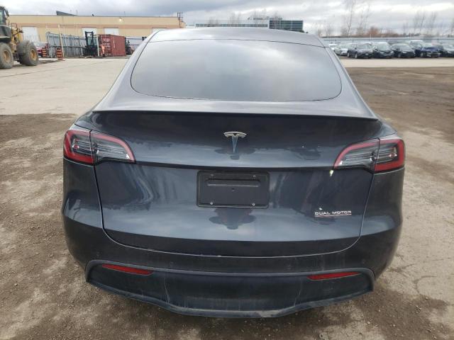 Photo 6 from auction – 2022 TESLA MODEL Y with VIN 7SAYGDEF6NF326772