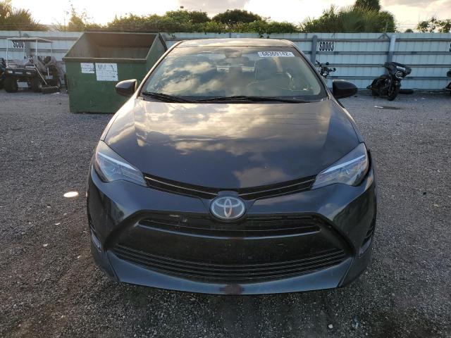 Photo 5 from auction – 2018 TOYOTA COROLLA L with VIN 5YFBURHE4JP783428