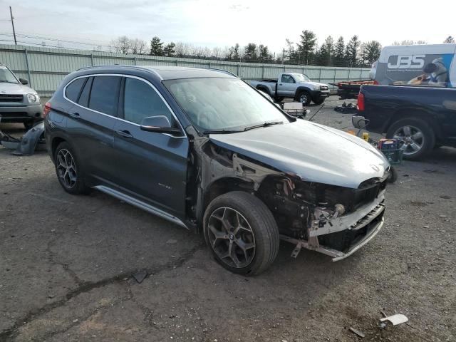 Photo 4 from auction – 2016 BMW X1 XDRIVE2 with VIN WBXHT3C3XG5F64243