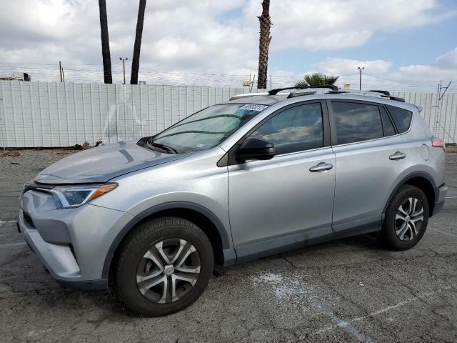 TOYOTA RAV4 LE 2016 with VIN 2T3ZFREV9GW290999 - Photo from auction
