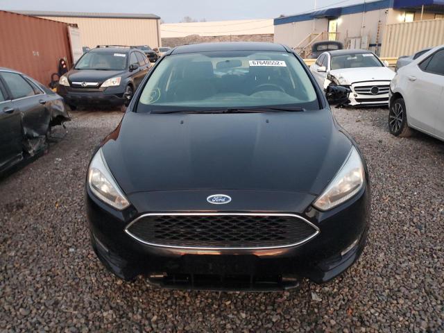 Photo 5 from auction – 2016 FORD FOCUS SE with VIN 1FADP3F22GL335220
