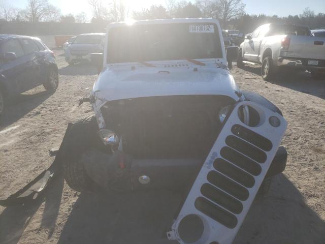 Photo 5 from auction – 2016 JEEP WRANGLER U with VIN 1C4BJWDG4GL123065
