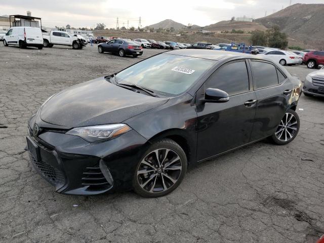 TOYOTA COROLLA L 2018 with VIN 5YFBURHE3JP743356 - Photo from auction