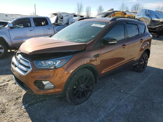 FORD ESCAPE TIT 2017 with VIN 1FMCU9JDXHUC22987 - Photo from auction