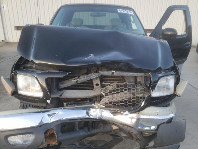 Photo 11 from auction – 2003 FORD F150 with VIN 1FTRX18L63NB01218