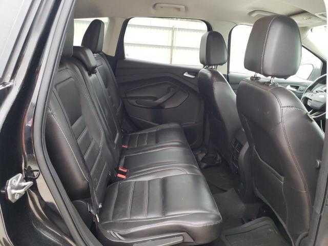 Photo 11 from auction – 2017 FORD ESCAPE TIT with VIN 1FMCU0J95HUD84310