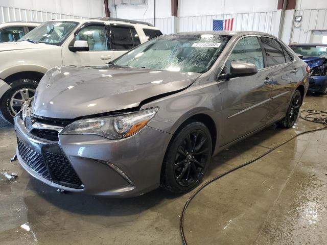 TOYOTA CAMRY LE 2017 with VIN 4T1BF1FK0HU676079 - Photo from auction