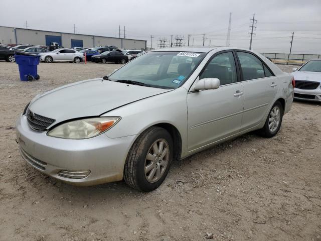 TOYOTA CAMRY LE 2002 with VIN JTDBF30K120018696 - Photo from auction