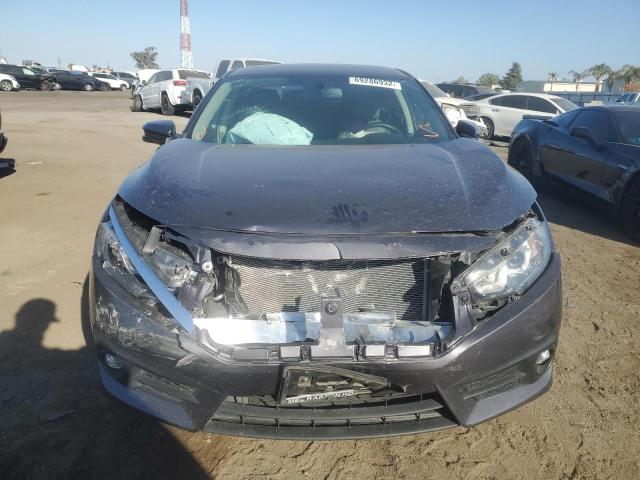 Photo 5 from auction – 2017 HONDA CIVIC EXL with VIN 2HGFC1F74HH657033