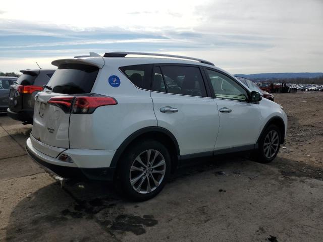 Photo 3 from auction – 2018 TOYOTA RAV4 LIMIT with VIN JTMDFREV1JJ721822