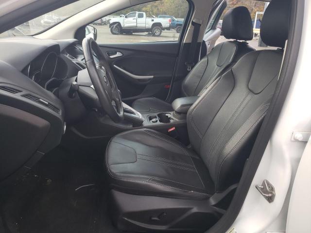Photo 7 from auction – 2014 FORD FOCUS SE with VIN 1FADP3F21EL274892
