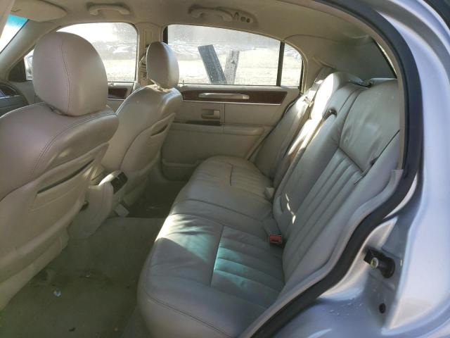 Photo 10 from auction – 2004 LINCOLN TOWN CAR E with VIN 1LNHM81W04Y622142