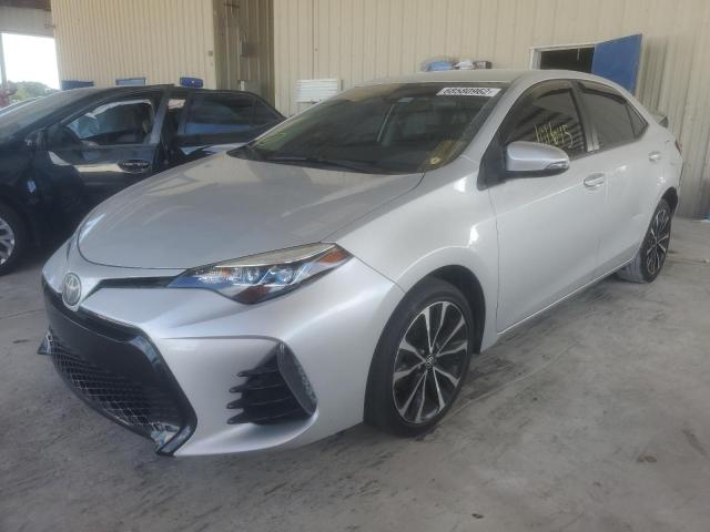 TOYOTA COROLLA L 2017 with VIN 2T1BURHE4HC879148 - Photo from auction