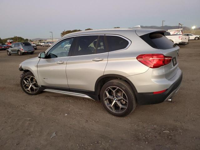Photo 2 from auction – 2017 BMW X1 XDRIVE2 with VIN WBXHT3Z30H4A58063