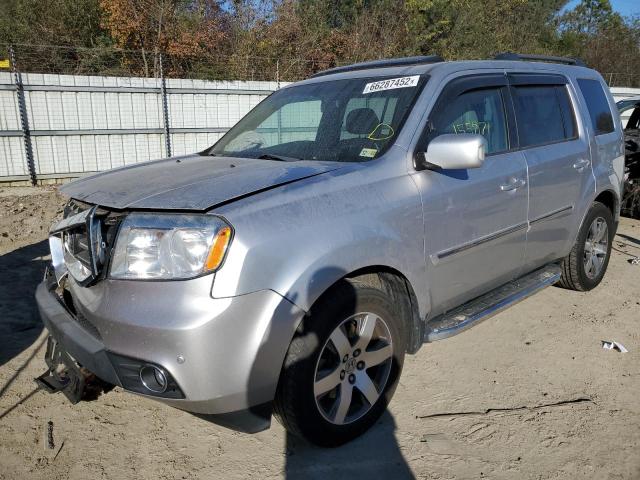 HONDA PILOT TOUR 2013 with VIN 5FNYF4H94DB063444 - Photo from auction