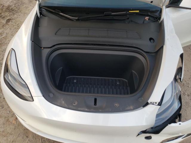 Photo 11 from auction – 2021 TESLA MODEL Y with VIN 5YJYGDEF1MF240152