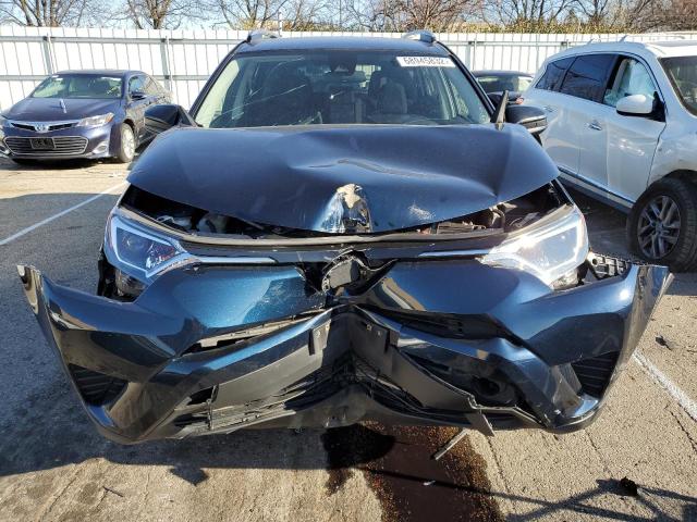 Photo 5 from auction – 2017 TOYOTA RAV4 LE with VIN JTMZFREV7HJ120673