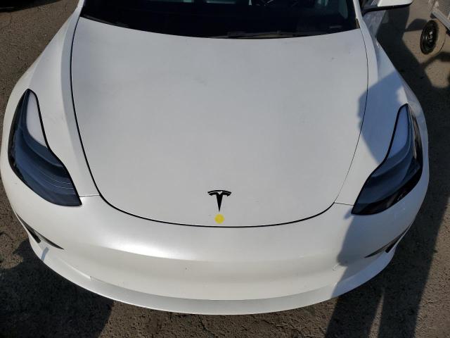 Photo 11 from auction – 2022 TESLA MODEL 3 with VIN 5YJ3E1EBXNF153654