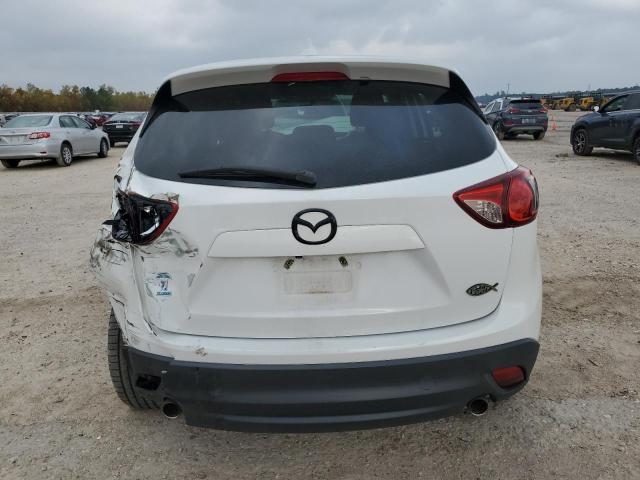 Photo 6 from auction – 2015 MAZDA CX-5 TOURI with VIN JM3KE2CY2F0532745