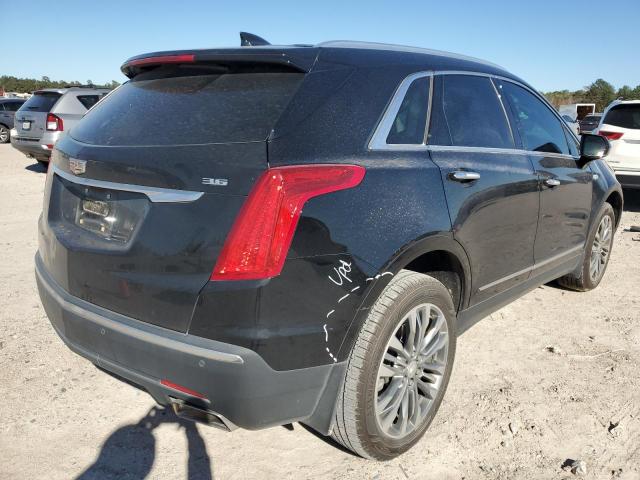 Photo 3 from auction – 2017 CADILLAC XT5 PREMIU with VIN 1GYKNCRS0HZ102349