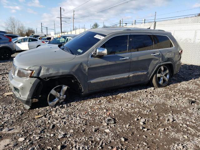 JEEP GRAND CHER 2011 with VIN 1J4RR6GT7BC574218 - Photo from auction