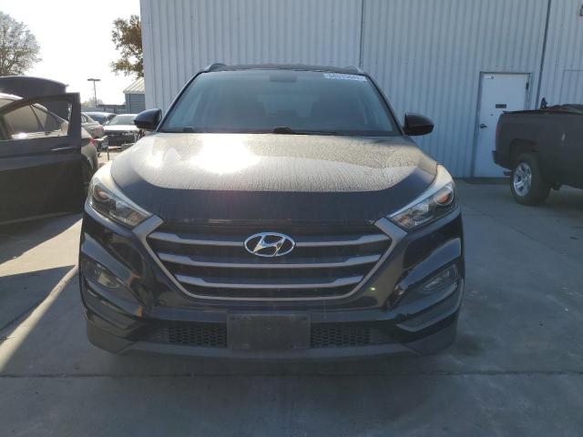 Photo 5 from auction – 2016 HYUNDAI TUCSON LIM with VIN KM8J33A44GU052678