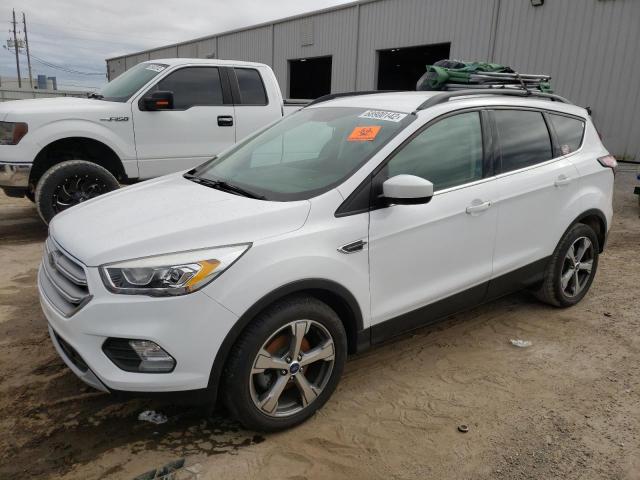 FORD ESCAPE SE 2017 with VIN 1FMCU0GD5HUD64036 - Photo from auction