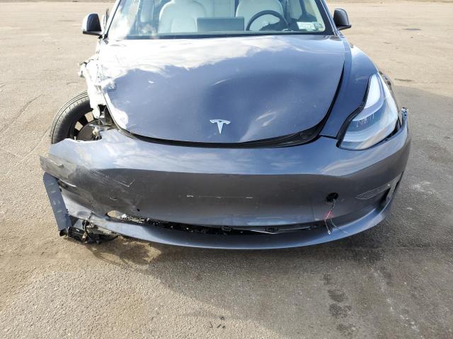 Photo 11 from auction – 2022 TESLA MODEL 3 with VIN 5YJ3E1EC1NF113701