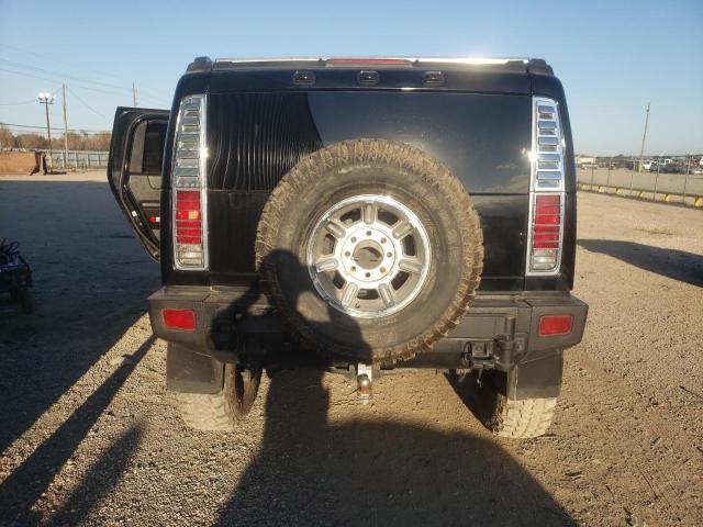 Photo 6 from auction – 2006 HUMMER H2 with VIN 5GRGN23U76H114841