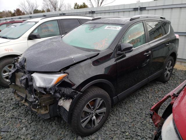 Photo 2 from auction – 2017 TOYOTA RAV4 XLE with VIN 2T3RFREVXHW581111