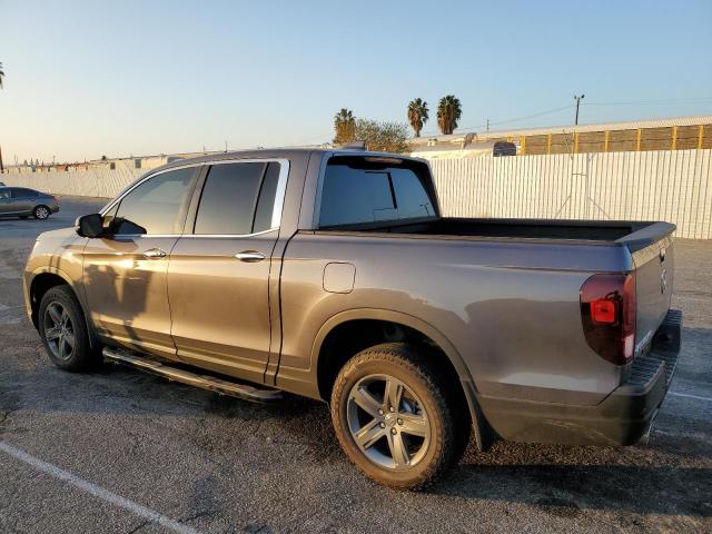 Photo 2 from auction – 2022 HONDA RIDGELINE with VIN 5FPYK3F79NB017530