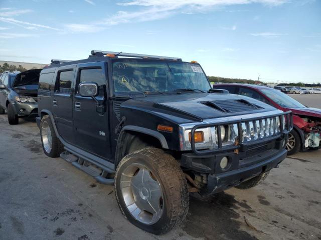 Photo 4 from auction – 2003 HUMMER H2 with VIN 5GRGN23U73H135944