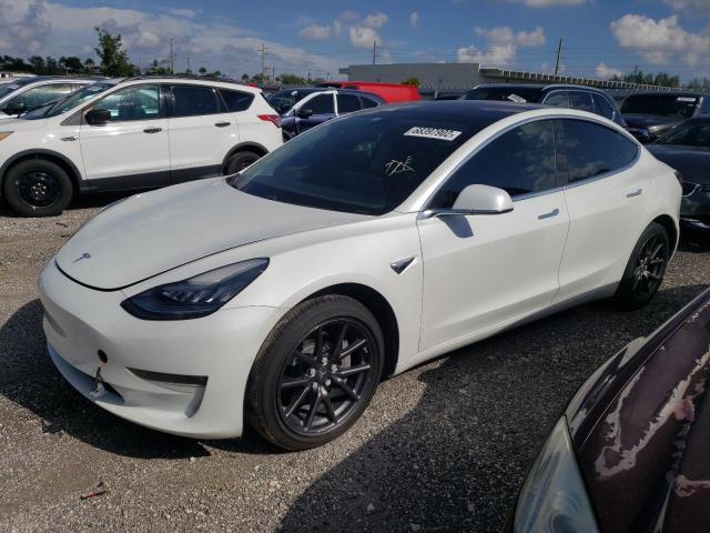 TESLA MODEL 3 2019 with VIN 5YJ3E1EB2KF199751 - Photo from auction