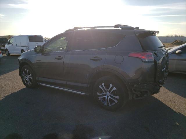 Photo 2 from auction – 2017 TOYOTA RAV4 LE with VIN JTMZFREV2HJ111427